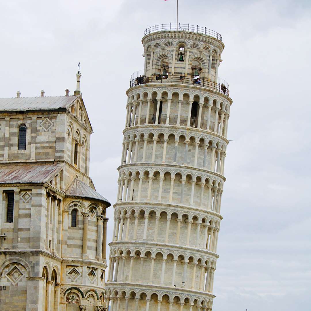 The Leaning Tower of Pisa in Italy, a symbol of historical significance and architectural wonder. ASK Consultants helps students to study in Italy with a 100% scholarship, providing free education on a minimum budget. Study in Italy with ASK Consultants.